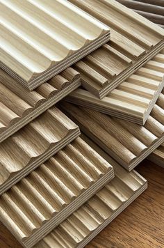 several wooden boards stacked on top of each other