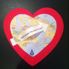 a paper heart with a map and an arrow on it that says make sure the world is god