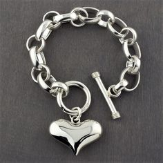 chunky sterling silver heart charm toggle bracelet Let Love Sparkle, Chunky Silver Jewellery, Ysl Lipstick, Unique Sterling Silver Jewelry, Mexican Silver Jewelry, Puffy Heart Charms, Wrist Jewelry, Love Sparkle, Silver Jewelry Design