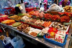 a buffet table filled with lots of different foods