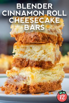 three cheesecake bars stacked on top of each other with the words, blender cinnamon roll cheesecake bars