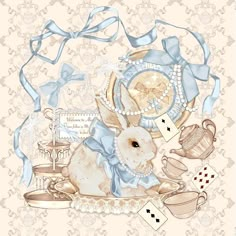 a rabbit is sitting on a table with some tea and playing cards in front of it