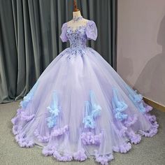 Organza Quinceanera Dress With Ruffles, Organza Quinceanera Dress With Ruffles For Debutante Ball, Lavender Ruffled Dress For Wedding, Organza Ball Gown With Ruffles For Quinceanera, Tulle Ball Gown With Attached Cancan For Debutante Ball, Purple Ruffled Ball Gown For Wedding, Lavender Ruffled Wedding Gown, Purple Princess Gown With Ruffles, Purple Fitted Tulle Ball Gown