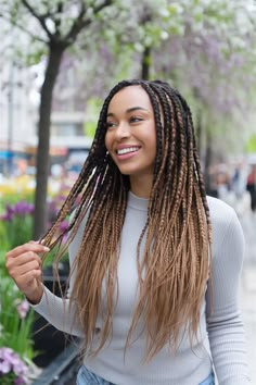 Discover the beauty of this elegant twist braided hairstyle for black women, perfect for those seeking a quick yet stunning look. The intricately woven twists create a chic updo that showcases your unique style. Add vibrant color, like deep red, and accessorize with beads to elevate your look for any occasion. Embrace easy maintenance while making a bold fashion statement that stands out in 2024. #braidedhairstylesforblackwomen Twist Braided Hairstyles, Colorful Dreads, Wavy Dreads, Boho Dreads, Dreadlock Maintenance, New Braided Hairstyles, Hairstyle For Black Women, Chic Updo, Dreadlock Styles