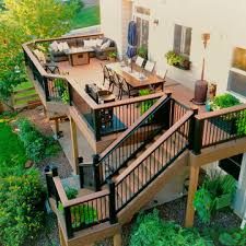 an aerial view of a deck and patio area