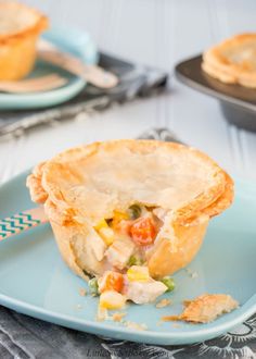 a chicken pot pie on a blue plate