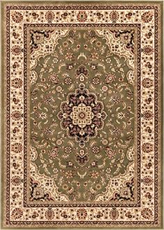 a green rug with an ornate design on the bottom and beige border, in front of a white background