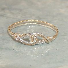 a gold ring sitting on top of a table