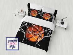 a bed with basketballs on it and the words sassy written in white letters