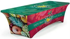 a table cover with fruit on it for an outdoor event or gathering, designed to look like a box