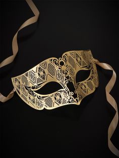 Our laser-cut metal mask boasts a stunning gold finish that shines and shimmers, ensuring you stand out in any crowd. Crafted with your comfort in mind, our mask is lightweight and easy to wear for hours on end.


Age Group/Gender - Adult/Men

Size/Type - One size fits all adults

Mask Color - Gold

Mask Material - Laser cut metal Gold Full Face Masquerade Mask For Carnival, Full Face Gold Masquerade Mask For Carnival, Gold Carnival Masks As Gift, Gold Eye Mask As Gift, Gold Carnival Masquerade Eye Mask, Gold Eye Mask Gift, Gold Eye Mask For Gift, Gold Full Face Mask For Party, Gold Full Face Party Mask