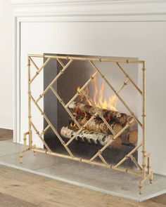 a fireplace with a fire in the middle