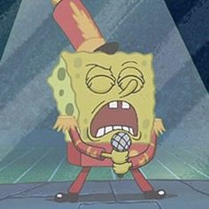 spongebob holding a microphone with its mouth wide open