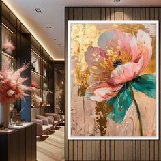 a large flower painting hanging on the wall