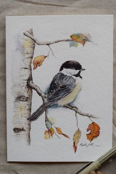 a watercolor painting of a bird perched on a tree branch with autumn leaves around it