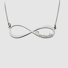 The Infinity Name Necklace is a timeless piece that intertwines elegance with personalization. Crafted delicately, it features the infinity symbol intricately inscribed with names or words of significance, symbolizing eternal connection and love. A stunning accessory that beautifully encapsulates meaningful bonds and everlasting affection. Classic Sterling Silver Infinity Necklace, Elegant Engraved White Name Necklace, Elegant White Engraved Name Necklace, Classic Silver Infinity Jewelry, Elegant Sterling Silver Name Necklace, Silver Infinity Necklaces For Wedding, Silver Infinity Necklace For Wedding, Elegant Engraved White Gold Name Necklace, Silver Infinity Name Necklace