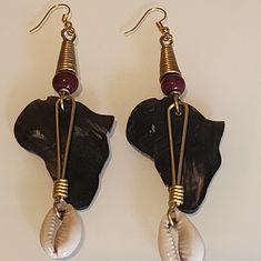 African Map, With Cowrie Shell Attached On Gold Wire. African Inspired Jewelry, Cowrie Shell Jewelry, Africa Earrings, Birthday Fit, Map Of Africa, African Map, Birthday Fits, Seashell Jewelry, Africa Map