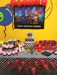 a birthday party with cupcakes and decorations