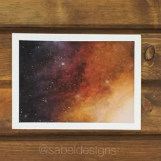 an image of the stars in the sky on a wooden background with text below it