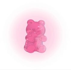 a pink gummy bear on a white background