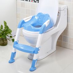 a child's potty chair sitting on top of a toilet