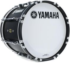 the yamaha snare drum is shown in black and white, with an emblem on it