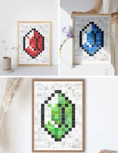 the pixel art is hanging on the wall next to a vase with flowers in it