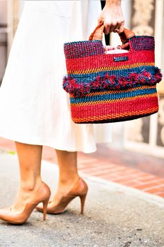 A keepsake to hold all keepsakes. 👜 #handbag #handbags #handbagstyle #raffia #fashionlover #raffiabag #tote #raffia #handbagoftheday #purse #purses #giftideas #shoulderbag #handwoven #handmade #blackowned #minorityowned #femalebusiness #femaleowned Luxury Woven Leather Crochet Tote Bag, Bohemian Weaved Tote Bag, Orange Bohemian Straw Bag, Rectangular Shape, Artisan Multicolor Straw Bag, Fair Trade, Bohemian Rectangular Straw Bag, Fair Trade, Raffia Tote Bag, African Bag, Ethnic Bag, Bvlgari Bags