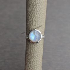 Natural Rainbow Moonstone Ring-blue Fire Moonstone | Etsy Moonstone Rings With Bezel Setting, Silver Stackable Rings With Natural Stones, Sterling Silver Round Moonstone Ring With Moon Phase, Spiritual Moonstone Birthstone Ring, Moonstone Ring With Moon Phase For Gift, Sterling Silver Moonstone Ring With Natural Stones, Round Moonstone Crystal Ring With Gemstone, White Moonstone Stackable Rings, Handmade Moonstone Ring With Round Stone