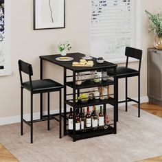 [3 PCS Pub Table Set] This bar table and chairs set includes 1 bar table (36.1"x19.6"x36.1") and 2 bar chairs (14.5"x16.5"x37.4"). The spacious desktop of it allows you to put in rolls and freshly squeezed orange juice for breakfast, and It is the perfect size and height for you while seating. Providing a fantastic place for you and your loved ones to gather for a drink, breakfast, afternoon tea, or casual meal. Size: Table with 2 Chairs.  Color: Black. Counter Height Kitchen Table, Kitchen Bar Table, Kitchen Table Set, Chairs For Small Spaces, Bar Table Sets, Pub Table Sets, Dining Room Table Set, Dining Furniture Sets, Kitchen Dining Sets