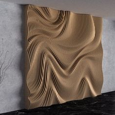 an abstract wall sculpture in the corner of a room