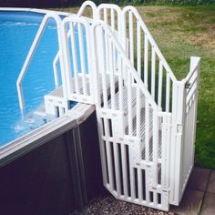 an above ground swimming pool with steps leading up to the water's bottom level