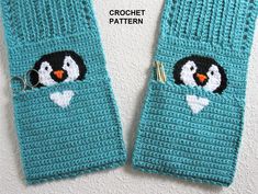 two crocheted penguin mittens are shown next to each other