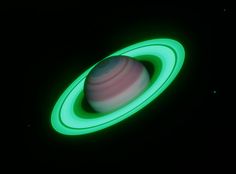 a green and white object in the dark