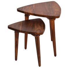 a wooden table and chair sitting next to each other