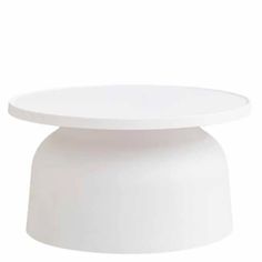 a white table with a round top