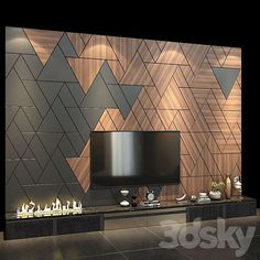 a modern living room with wood paneling and fireplaces in the center, along with a flat screen tv mounted to the wall