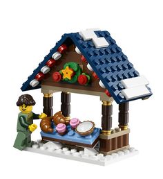 a lego house with a woman and child outside