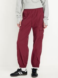 elastic-drawstring waist faux fly front pockets flap-cargo pockets at thigh side-zip hem elasticized cuffs sits at belly button loose hip and thigh tapered leg hits at ankle 29" regular inseam 27" petite inseam 32" tall inseam models are approx.  5'9" and wear sizes s (4), l (12), and xl (18)machine wash according to the care instruction label  . Best Holiday gift for Women , perfect Joggers for Christmas! Red Relaxed Fit Sporty Sweatpants, Affordable Red Sweatpants With Pockets, Red Cotton Relaxed Fit Joggers, Red Joggers With Pockets, Nylon Joggers With 4-way Stretch And Pockets, Cargo Joggers, Family Pajamas, Old Navy Women, Petite Size