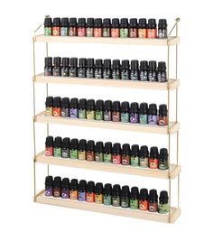 the shelf is filled with many different types of oils and essentials to choose from