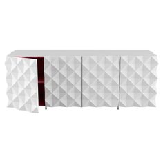 a white cabinet with red doors and geometric design