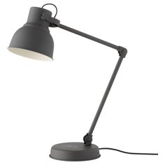 a gray desk lamp on a white background