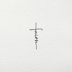 the word faith written in cursive ink on white paper