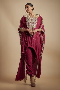 Maroon high low kurta with mukaish embroidery, elevated with floral, geometric hand embroidery and multi color tassels. Paired with coordinating pant. - Aza Fashions Geometric Hand Embroidery, Mukaish Embroidery, High Low Kurta, Radhika Madan, Payal Singhal, Rhea Kapoor, Mira Rajput, Anushree Reddy, Sanya Malhotra