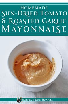 homemade sun - dried tomato and roasted garlic mayonnaise in a white bowl on a table