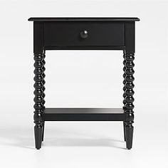 an end table with two drawers and one drawer on the bottom, in black wood