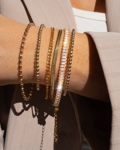 The curb link bracelet is one of our classic and most coveted designs, with a flat surface that glimmers in the night, this timeless silhouette is a staple your jewelry collection didn’t know it needed. Harper is made to layer with beads, links, watches and everything in between. 14K Gold Fill Curb link bracelet Sizing: 6.5", 7" Please measure wrists before ordering if unsure about sizing. Round up if between sizes. Everyday Gold Bracelet, Watch Stack, Gold Bracelet Stack, Small Bead Bracelet, Gold Bracelets Stacked, Wrist Stack, Bracelets Beads, Cz Bracelet, Gold Bead Bracelets