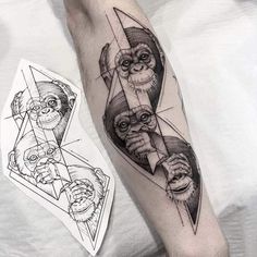 a man's arm with tattoos on it and an image of three wise monkeys