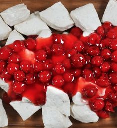 there are cherries and marshmallows on top of tofu cubes