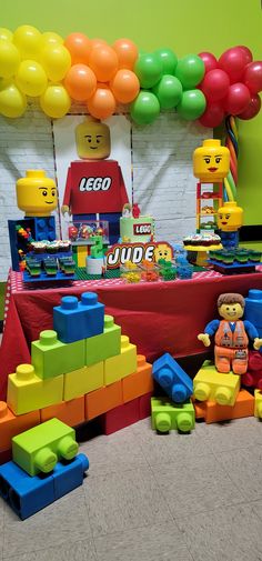 lego themed birthday party with balloons and toys